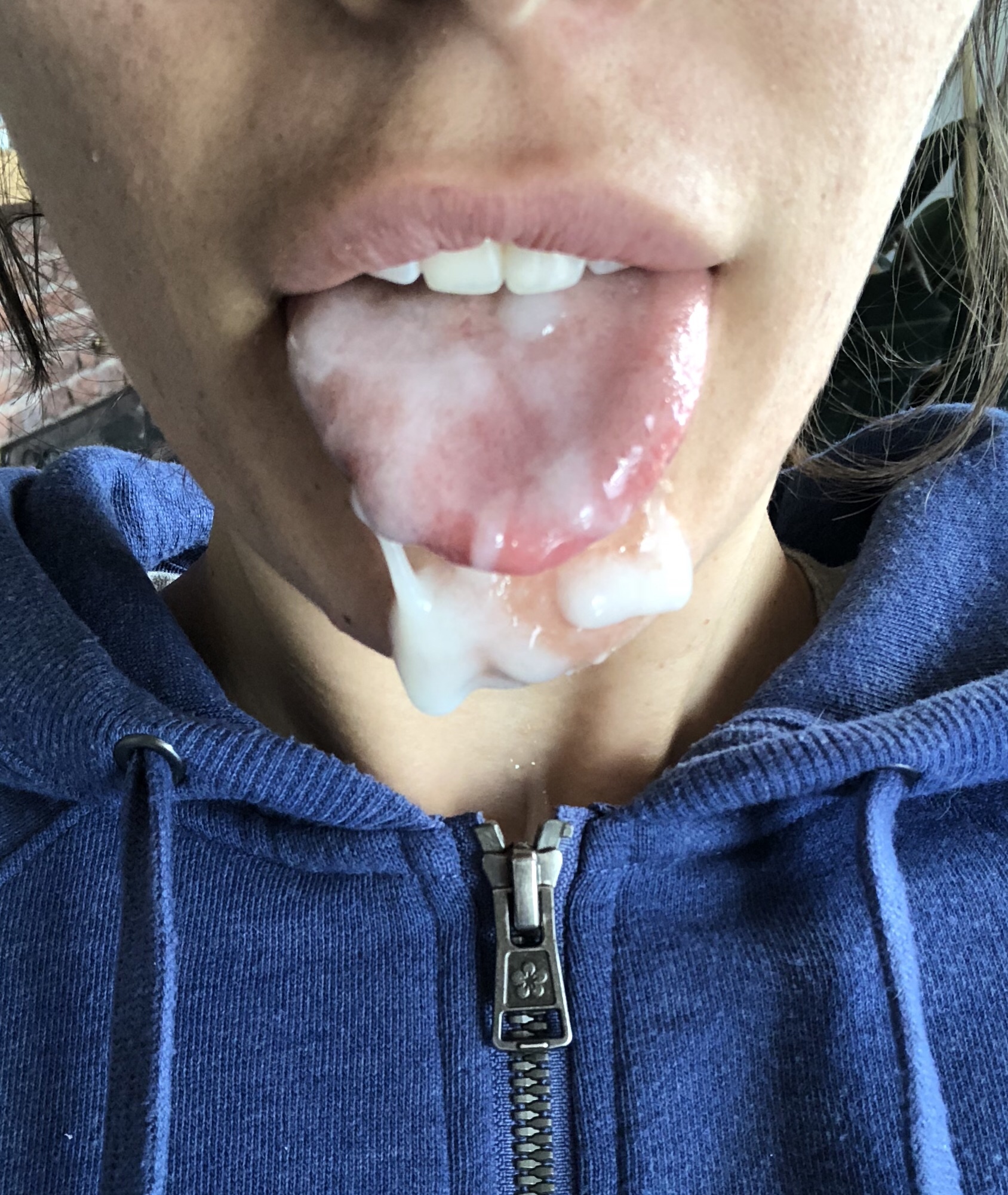 Skinny girl with cum on her face