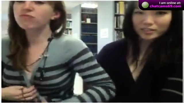 Two girls in the library on webcam