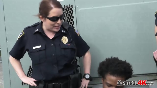 Horny female officers take on criminal with big cock