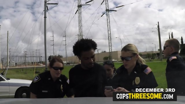 Nasty female cops in uniform make a naughty threesome
