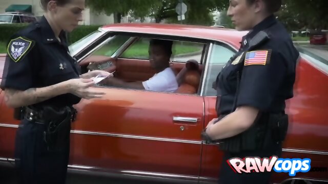 Interracial doggystyle in public for a sexy tattooed MILF cop.
