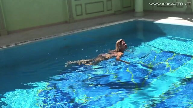 Mary Kalisy Russian Pornstar swims naked in the pool