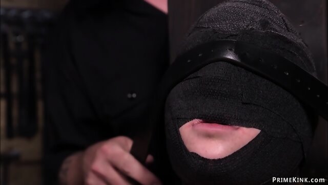 Blindfolded slave on device bondage
