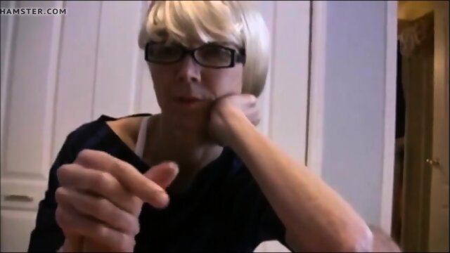 Hot mature mom giving a slow handjob to her hubby till cum