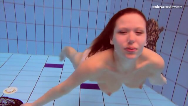 Fun naked girls get naughty in the pool