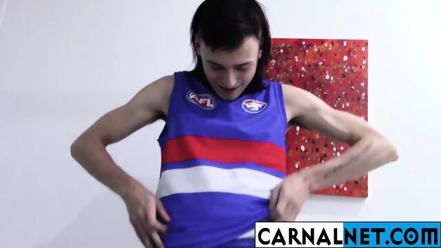 Cute Australian guy licks his own massive ten-inch cock!