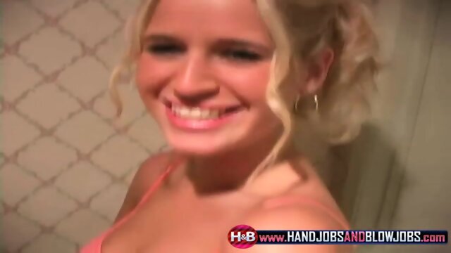 Nicole gives a handie in the bathroom