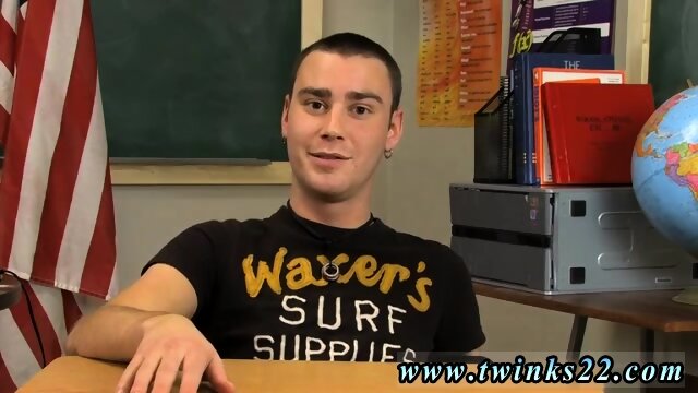Young teen male gay sex Young dark haired lad Justin Giles sits at a desk in a classroom