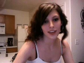 amateur photo Pulls down top to reveal petite boobs