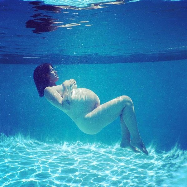 Alanis Morissette in a swimming pool.