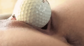 amateur pic Swallowing Golf ball with Grip.
