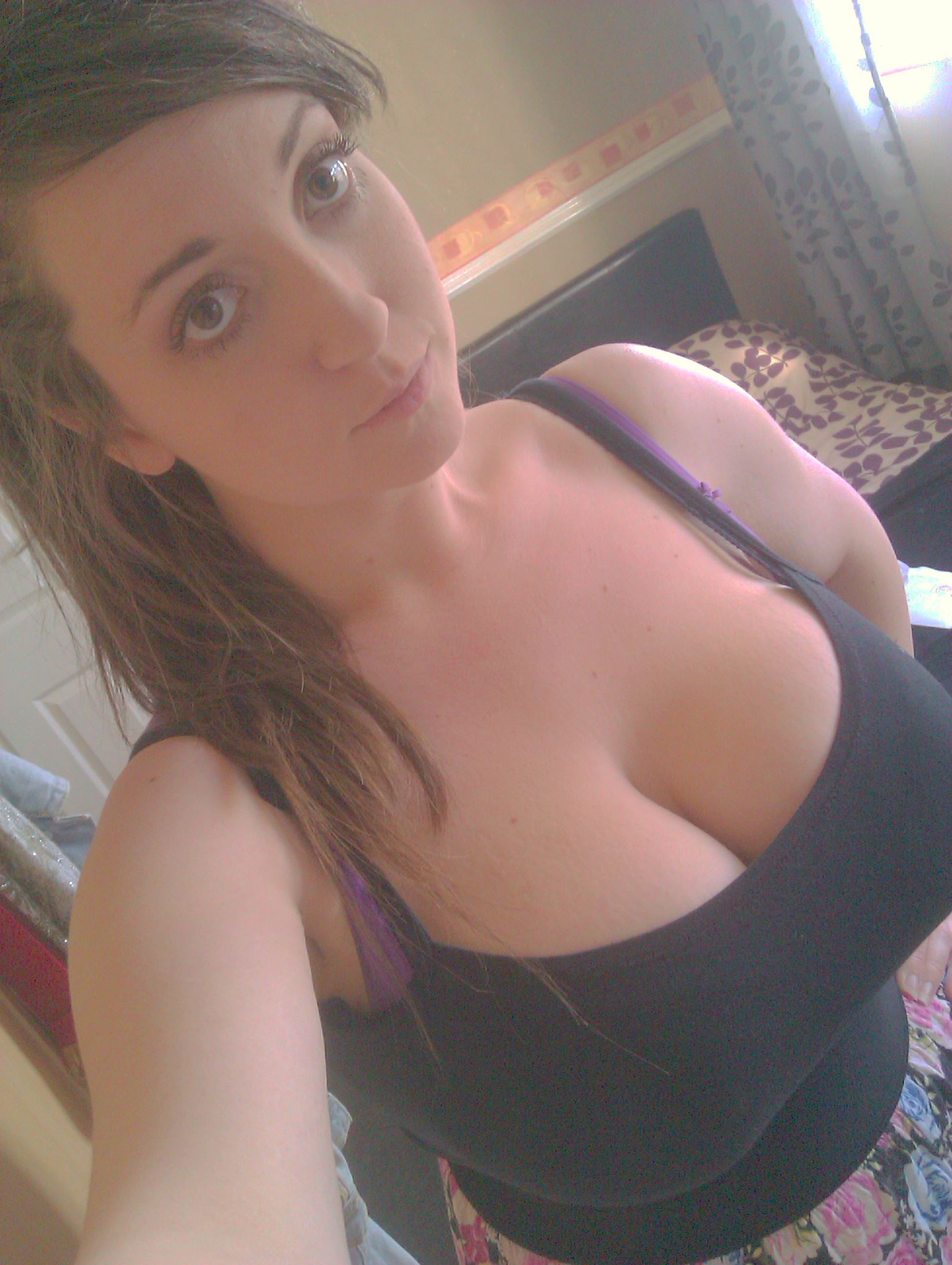 Cute and curvy cleavage Porn image