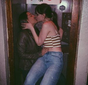 amateur photo fighting in a phone booth