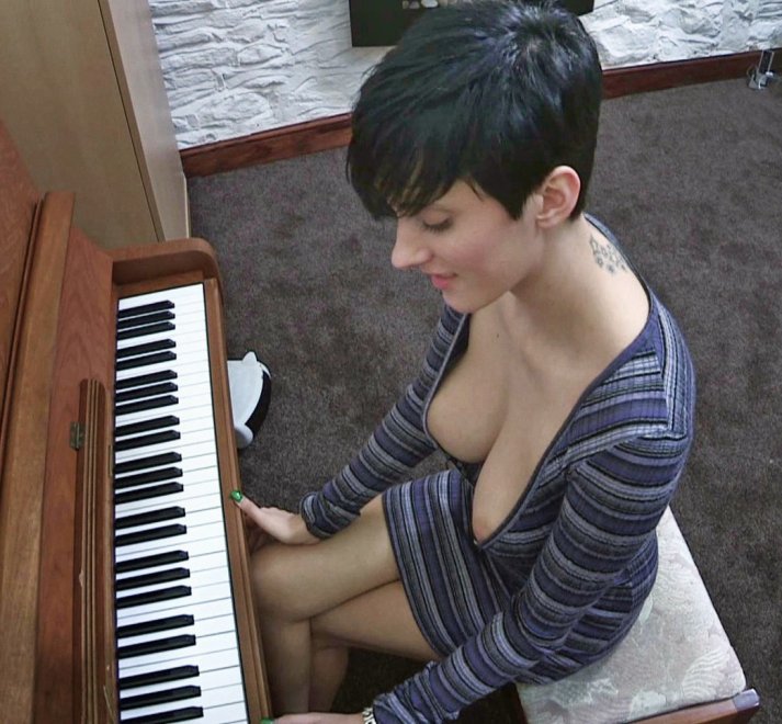 At the piano