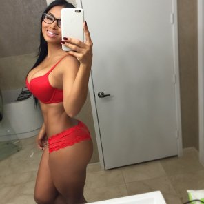 Red lingerie sure looks good on her, selfie