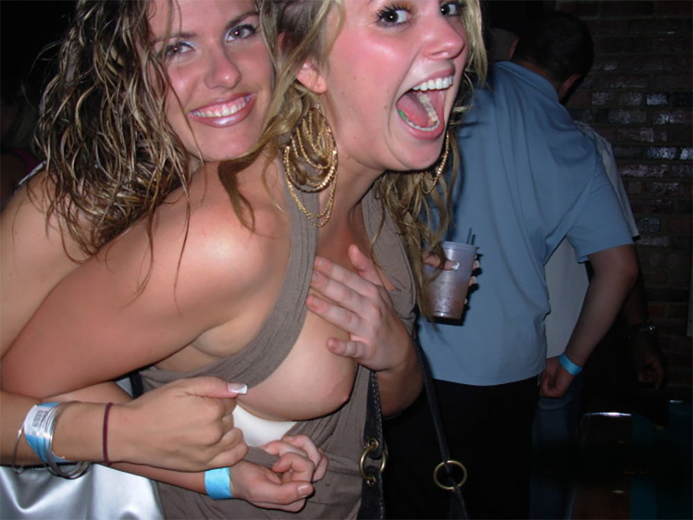 Embarrassed Girl Nip Slips. showing off her friend s boobs porn pic. 