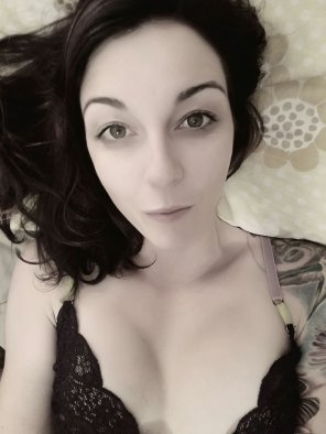 Pretty girl lying in bed