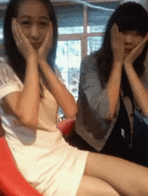amateur photo Asian girl's friend reveals her lack of panties