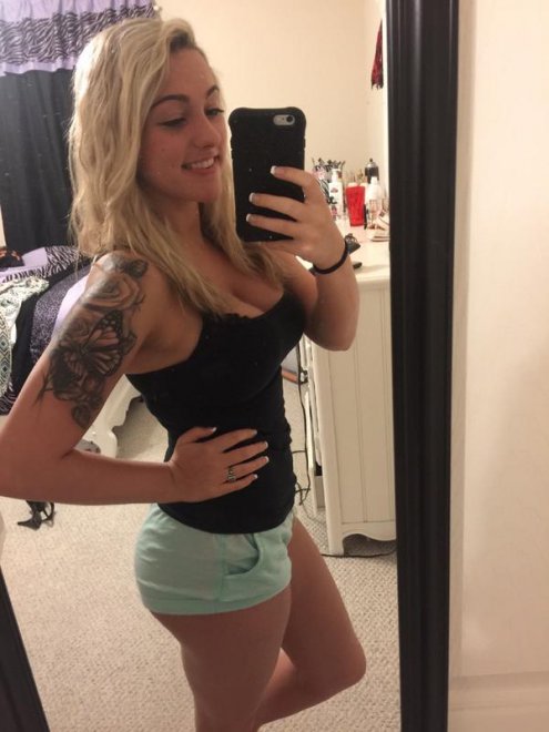 Showing off her...tattoo