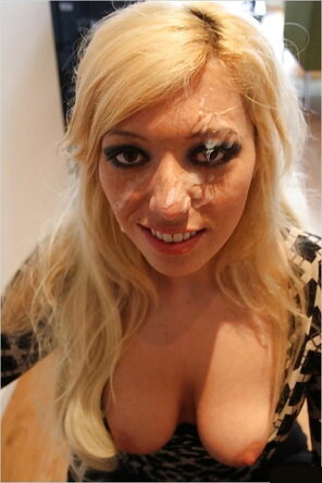 amateur photo Beautiful blonde with a bit of a messy face.