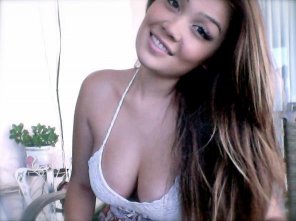 Innocent Asian popping out of her shirt