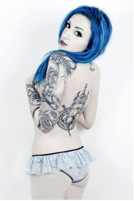 Blue hair and pale skin
