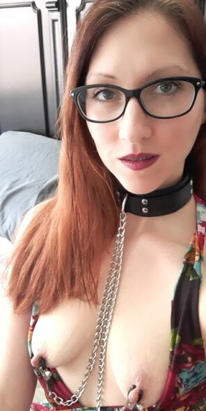 amateur photo Don't let the glasses distract you from the nipple clamps!