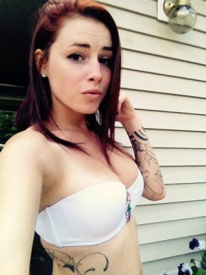 amateur photo Red head on the porch
