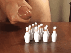 amateur photo Cock cumming on tiny bowling pins