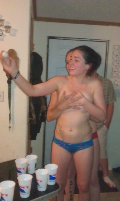 Feeling her boobs during a game of beer pong.