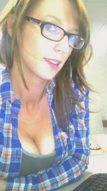 Girl with glasses and flannel