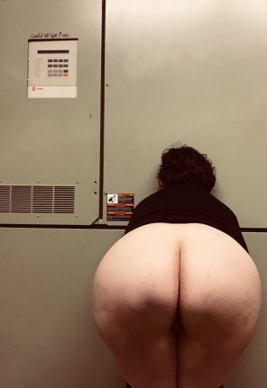 Naughty at work in the mechanical closet. Waiting for someone with a big tool.