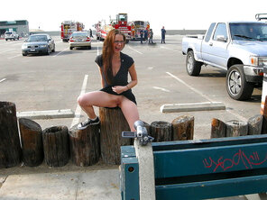 Goofy girl flashing in front of the firemen