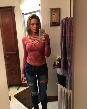 amateur photo Ripped jeans and a tight top