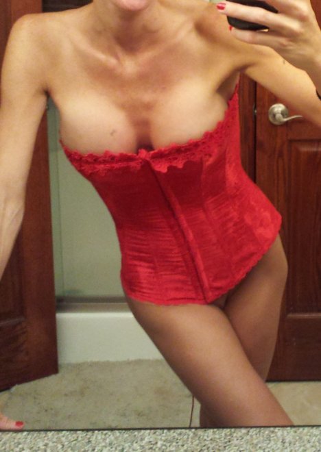 Wife's tight red corset