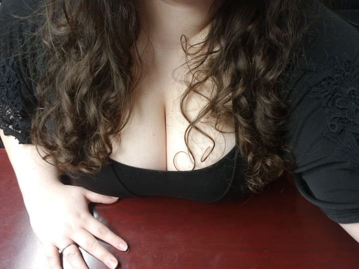 [f] Bent over the conference table