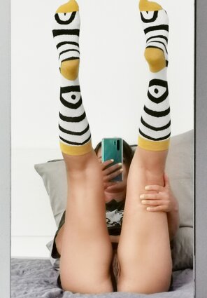 amateur photo I'll wear this socks for a party tonight, but I can't decide what would go with them, any help? ðŸ¦“
