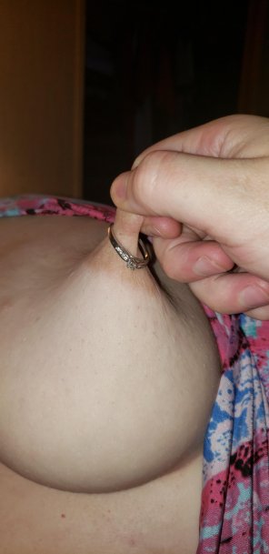 amateur pic About last night . Cum all over my ring!! God I love it when he pinches my nipples hard!!