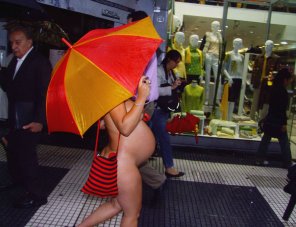 amateur photo Nude and raining...just strolling down the sidewalk