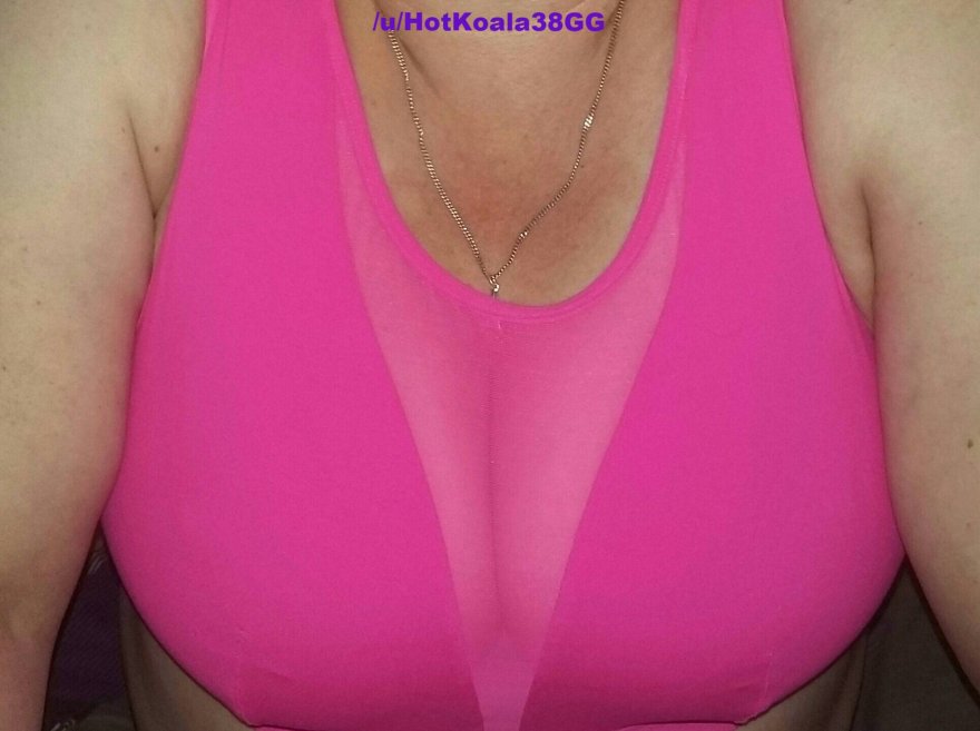 MILF with big natural 38GG boobs wearing an extremely tight pink see through sports bra for your entertainment ðŸ’‹ðŸ¨ be kind and I might drop them.