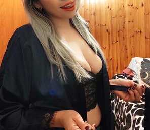 Karol busty latina milf in a corset and C-string