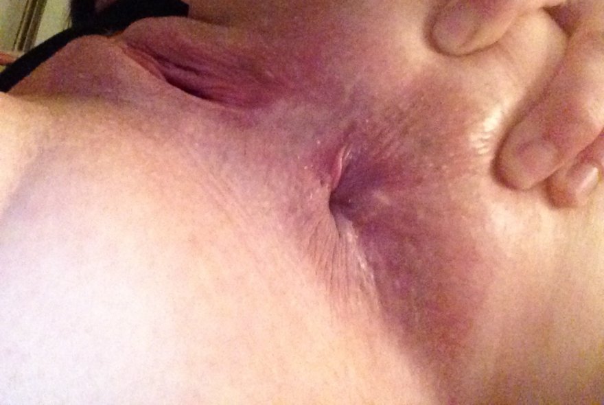 My wife's perfect asshole. I'd love to watch someone fuck that tiny little hole