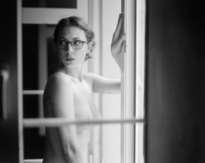 amateurfoto Standing at the window