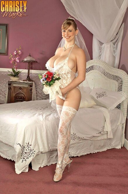 Brunette-Bride-Christy-Marks-with-Huge-Naturals-Wearing-White-Stockings-in-Bed-Playing-With-Dildo-1