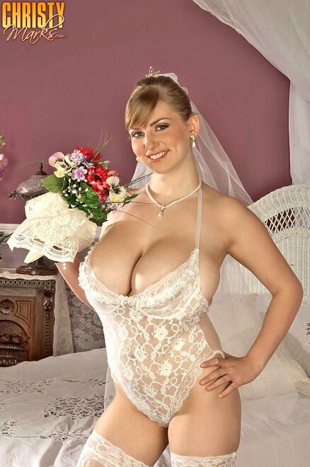 Brunette-Bride-Christy-Marks-with-Huge-Naturals-Wearing-White-Stockings-in-Bed-Playing-With-Dildo-2