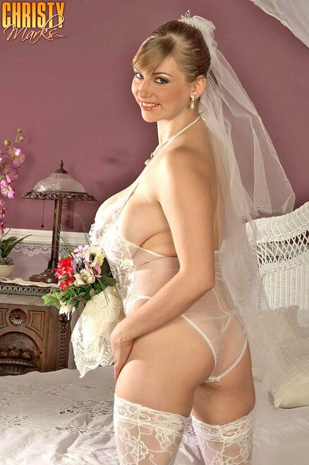 Brunette-Bride-Christy-Marks-with-Huge-Naturals-Wearing-White-Stockings-in-Bed-Playing-With-Dildo-3
