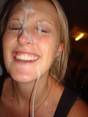 amateur photo She loves having cum dripping down her face.
