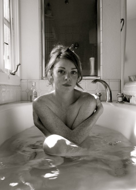 Black & white of a model in the tub