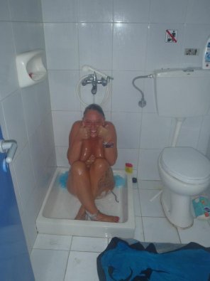 amateur pic hiding her parts in the shower