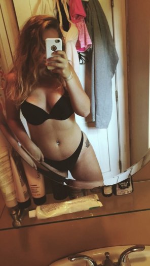 PictureBlack underwear and a bellybutton ring
